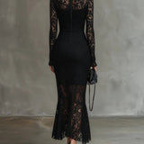 Leonor | Vestido maxi preto de renda.