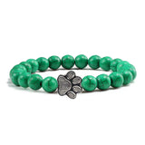 Margarida - Pulseira com estampa de patas decorada com miçangas.