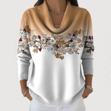 Matilde | Camisola floral com decote suave.