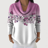 Matilde | Camisola floral com decote suave.