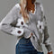 Belinha | Camisola Elegante com Decote em V e Padrão Floral - Ines Braga