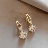 LuzDour Brincos Elegantes com Zircônias em Ouro - Exclusivos - Ines Braga
