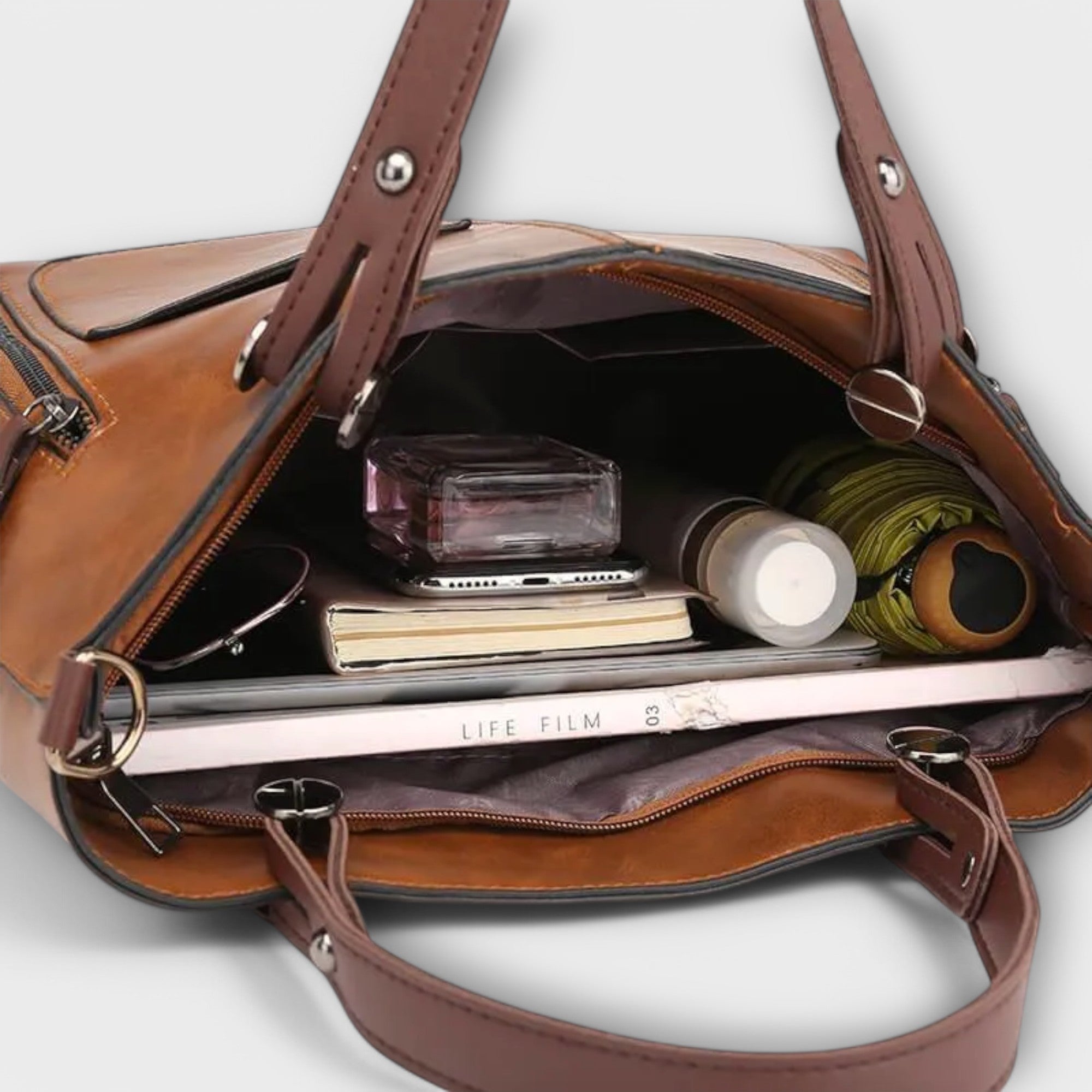Maria. - Bolsa de couro elegante - Ines Braga