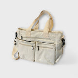 Maria. - Mala com vários bolsos - Ines Braga