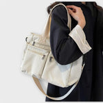 Maria. - Mala com vários bolsos - Ines Braga