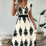 Candela – Vestido maxi barroco com decote em V