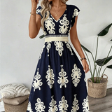 Candela – Vestido maxi barroco com decote em V