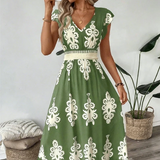 Candela – Vestido maxi barroco com decote em V